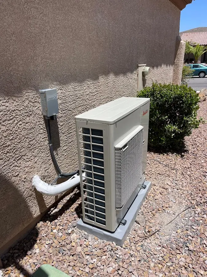 Residential air conditioning condenser unit in Murraysville